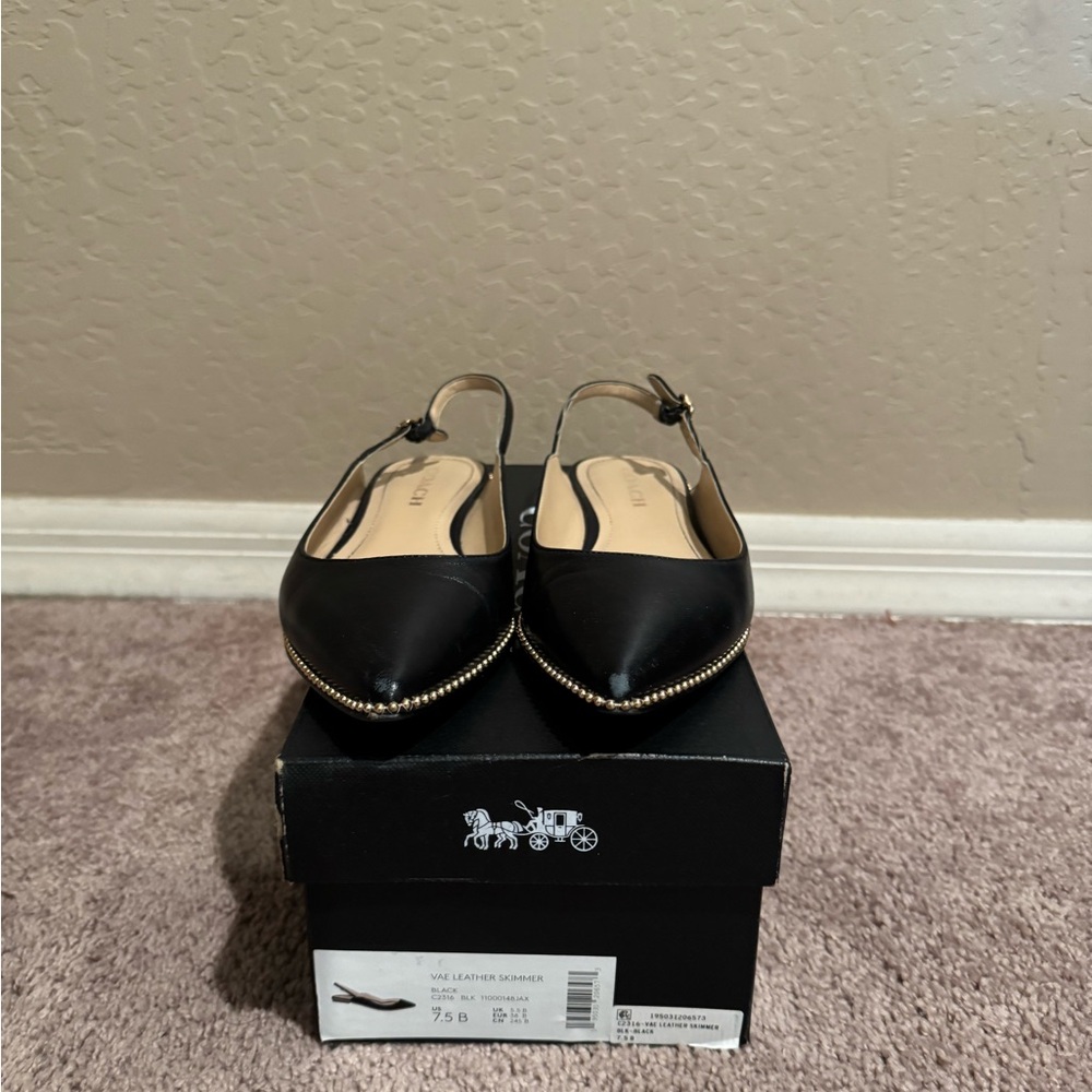 Black Coach leather gold studded flats
